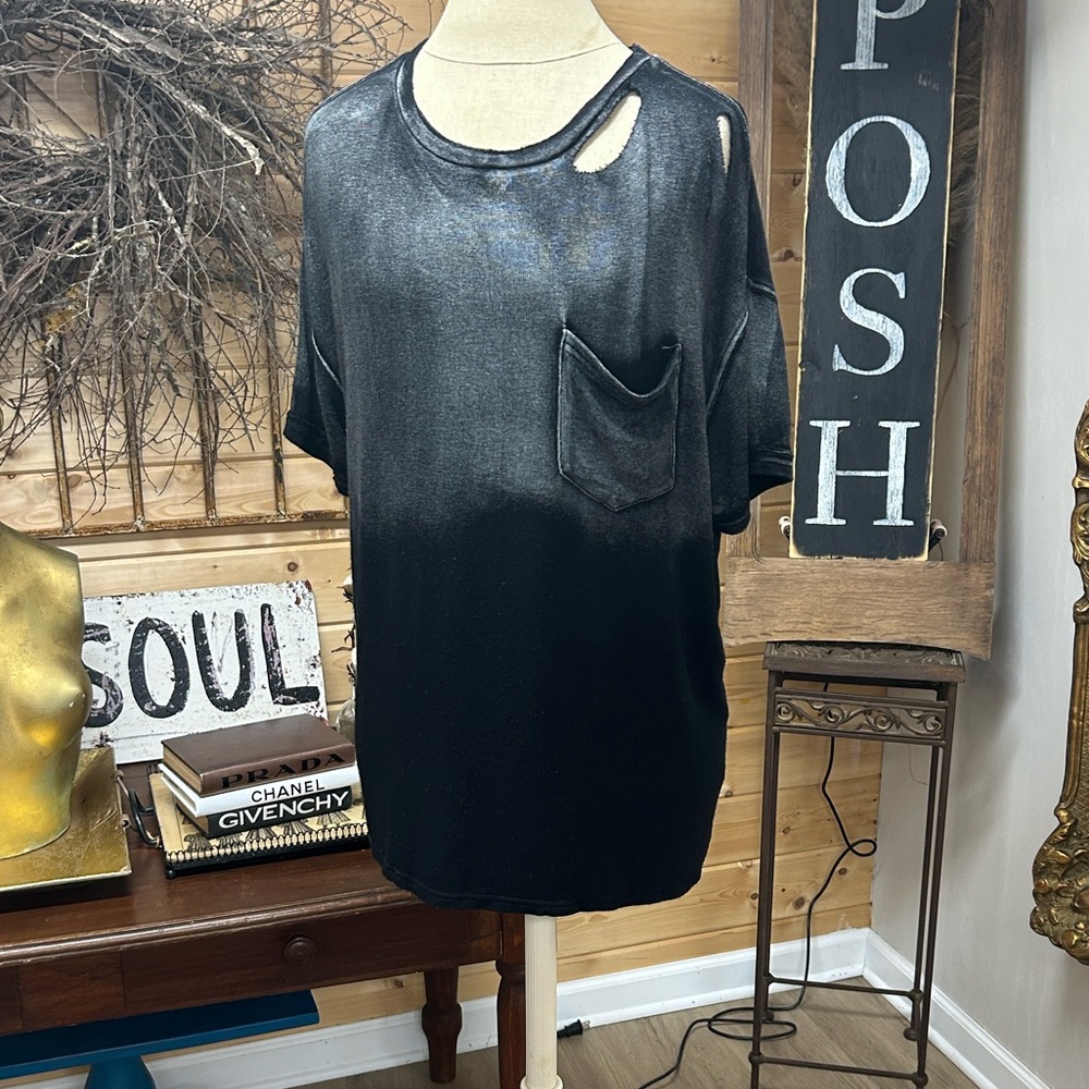 Soft and flowy shredded top